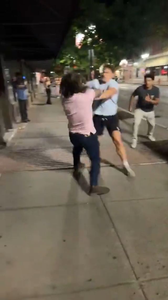 crazy group fight in the middle of the street
